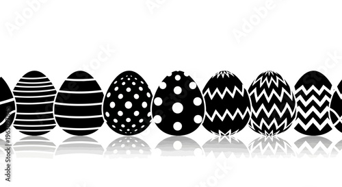 Row of black and white patterned Easter eggs with reflections.