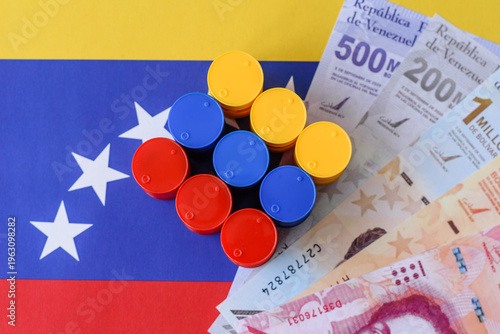 Metal barrels of oil, gas, or chemicals on the Venezuelan flag, Venezuela production. Barrels of oil