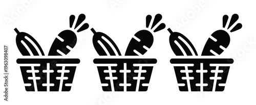 Three baskets filled with carrots and cucumbers, black and white