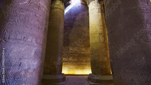 Temple of Edfu with massive carved columns and detailed hieroglyphs, revealing the atmosphere of Ancient Egyptian architecture and sacred space. Egypt.