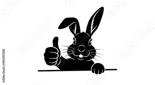 Black silhouette of a cheerful rabbit giving a thumbs up gesture.