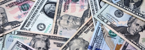 Wallpaper Mural Big pile of US dollar bills in various nominations. United States money banknotes Torontodigital.ca