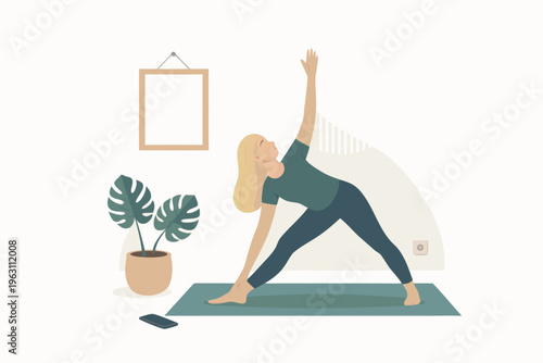 A woman practices yoga in a serene and peaceful home environment