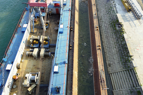 Принти на полотні Top-view of industrial barge deck with cable systems and winch equipment