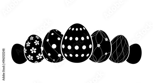 Black and white Easter eggs with various patterns in a row.