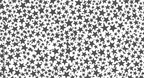 Seamless pattern of scattered dark grey stars on a white background graphic design