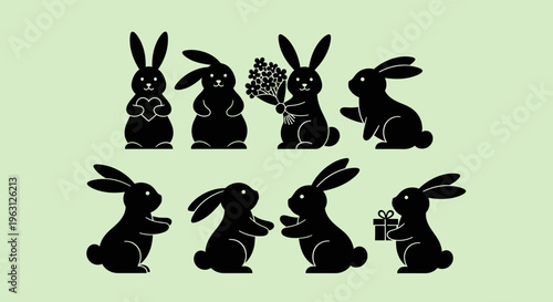 Collection of black rabbit silhouettes in various poses and interactions.