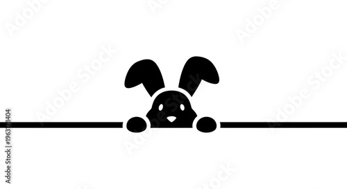 Cute black bunny peeking over a horizontal line.