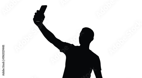 Silhouette of a man taking a selfie with his smartphone raised high in the air