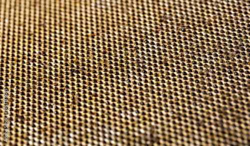 Quadro em tela A close-up of Selective of a dirty kitchen range hood filter clogged with grease