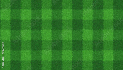 Plaid or checkered pattern on green grass soccer field or mown lawn