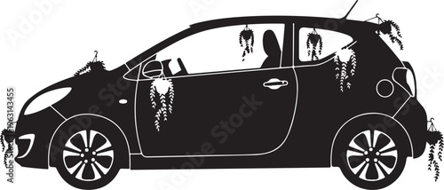 Black silhouette of a car with hanging plants