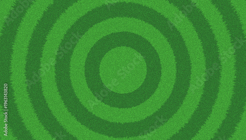 Abstract green grass background with concentric mown rings pattern