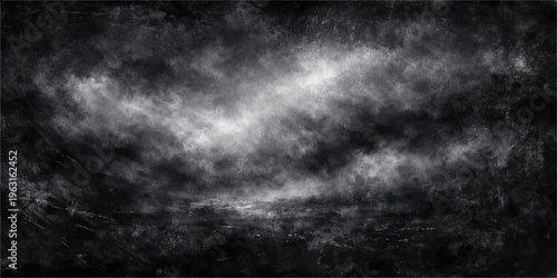 A dramatic dark stormy cloudscape texture with motion and light creates a moody nature backdrop featuring black and white clouds against an overcast sky