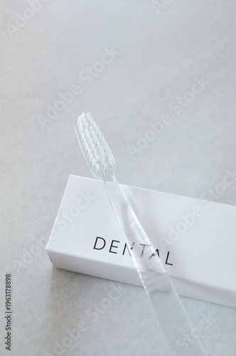 Clear Toothbrush Put on Dental Box with Copy space