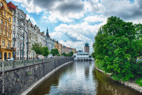 Certovka flowing through Prague with buildings in the background