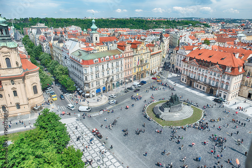 Tourists walking in busy old town square, Prague, Czech Republic