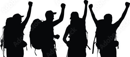 Black silhouettes of happy backpackers raising arms in celebration after reaching the mountain summit during a group trekking adventure journey