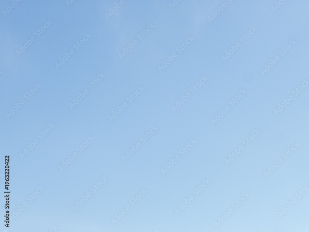 Obraz premium Soft blue sky gradient with smooth natural lighting and no clouds. Clean minimal background ideal for copy space, modern design, websites, presentations and abstract visuals.