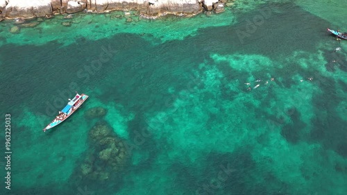 Aerial View of Snorkelers and Longtail Boats in Ko Tao Bay Thailand