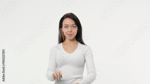 Happy cheerful student girl wearing backpack Young woman standing isolated over white background. College student concept