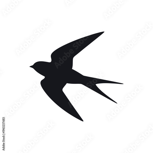 Black silhouette of a bird in flight flying wings spread 1