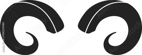 Black ram horns symbolizing strength and Aries zodiac sign