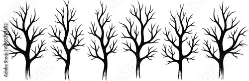 Silhouette of five bare trees in winter