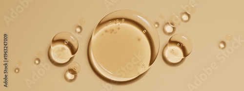 Tableau sur toile Wide banner featuring golden liquid oil droplets illustrating pure vitamin c ski
