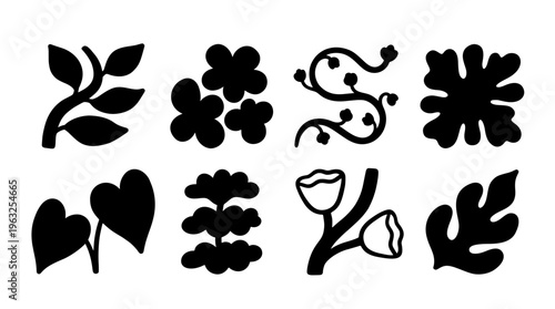 Collection of bold hand drawn minimal botanical elements. Set features black leaf, vine, and floral vector silhouettes for abstract graphic design