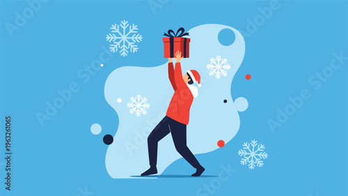 Young man in a red sweater and santa hat lifting a large wrapped christmas gift box high against a blue snowy background.
