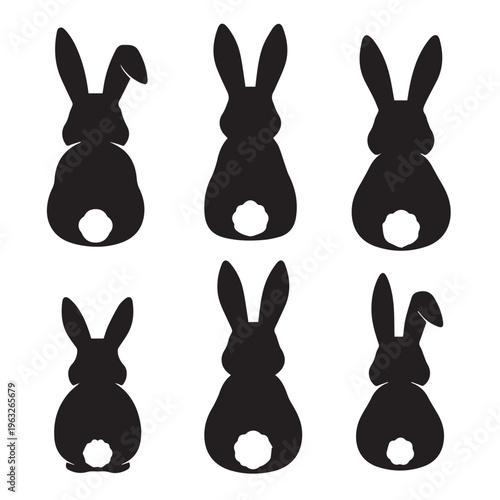 Black rabbit silhouettes sitting on a white background Vector