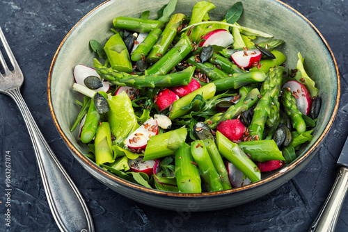 Clean eating salad with asparagus radish and flax seeds