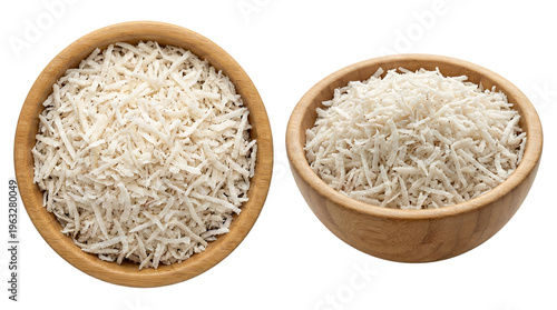 Shredded grated coconut flakes in wooden bowls isolated on transparent background for food packaging design.