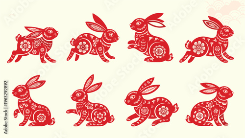 Set of traditional Chinese New Year red paper-cut rabbit zodiac symbols in various jumping and sitting poses on light background.
