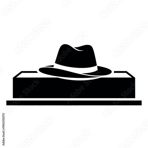 Fedora hat on a rectangular block.