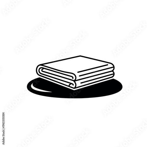 Folded Towel Stacked Neatly on Surface.