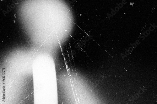 Vintage Film Grain Cinema Background with Projector Light Leak Glow Dust Scratch Overlay Distressed Analog Texture Black Retro Effect with Copy Space