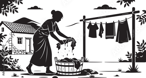 Silhouette of Woman Washing Clothes Traditionally in Village