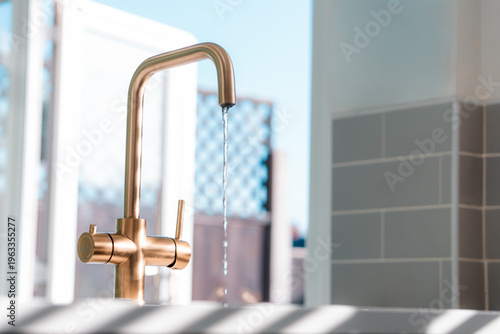 Quadro su tela Gold kitchen tap faucet and sink, clean home interior