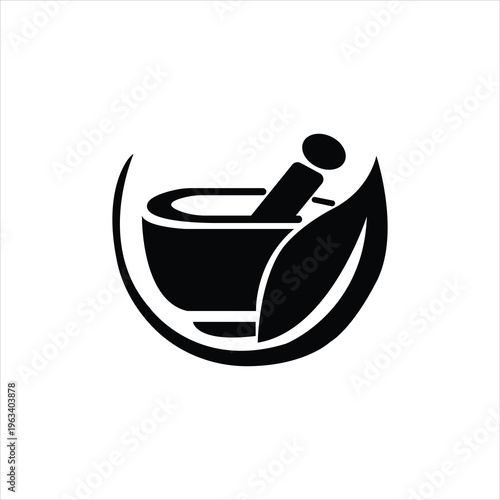 A pot and a leaf for crushing betel leaves