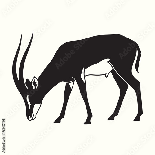 A striking black silhouette of an oryx grazing showcasing its elegant horns and form high quality