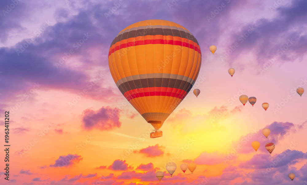 Obraz premium Amazing aerial view of hot air balloons at sunrise in Cappadocia beautiful skies
