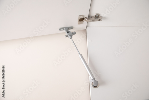 Valokuva Lifting mechanism for kitchen doors.