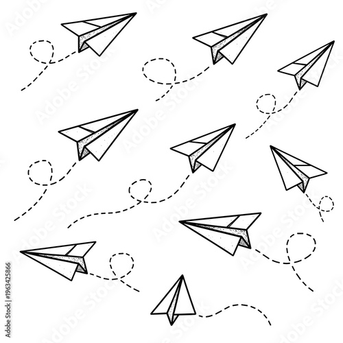 Pattern of paper planes flying through clouds