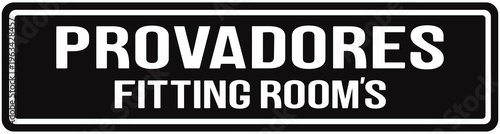  sign that says in portuguese and english : fitting rooms.	
