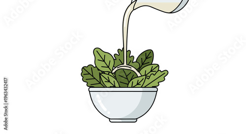 A creamy white dressing is being poured from a pitcher into a white bowl filled with vibrant green salad leaves against a pure white background.