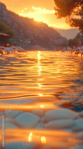 A serene scene with the sun setting behind a calm water pool