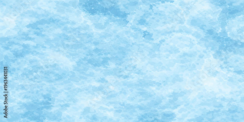 A serene winter cloudscape featuring a bright blue sky with white clouds over a frozen nature surface of ice and frost patterns for an abstract seasonal background