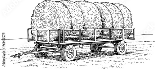 Black and white of a farm trailer loaded with round hay bales a grassy field agriculture